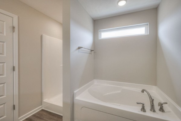 6 Laurel View Street Manchester, TN 37355 - Photo 8 of 11 a white bath tub sitting next to a shower
