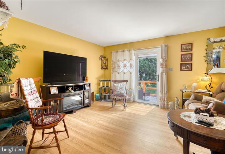 15-4 Cranberry Ridge Reading, PA 19606 - Photo 7 of 19 a living room with furniture and a flat screen tv