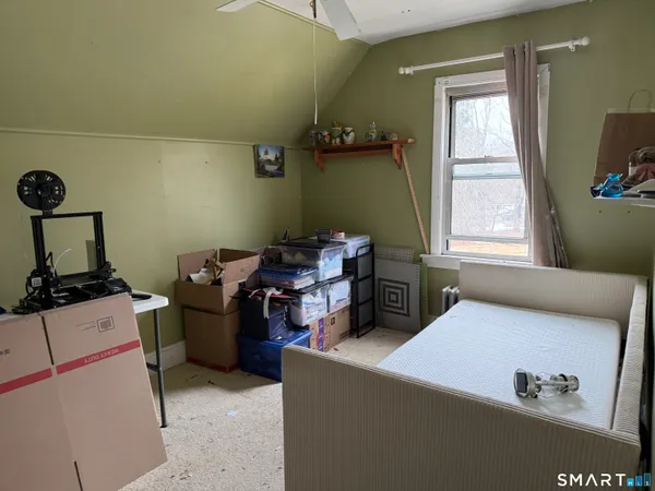 a room with furniture and window