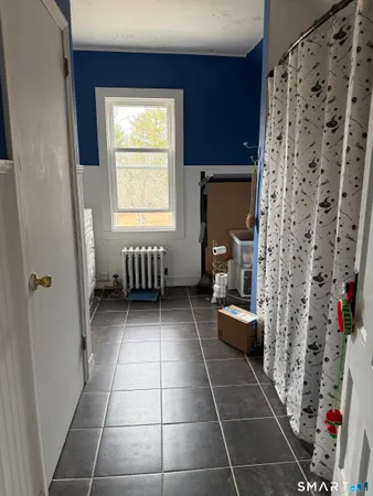 a bathroom with a toilet and a sink