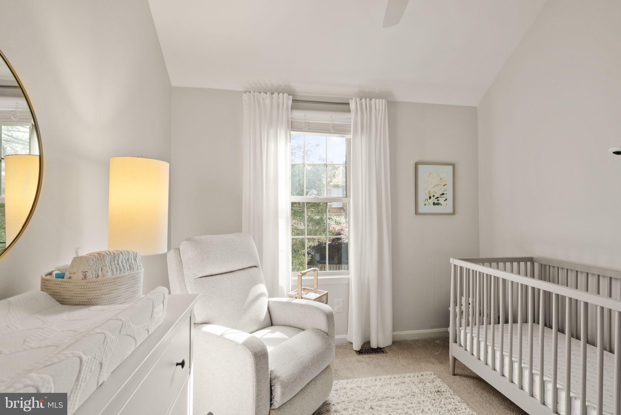 6369 English Ivy Way Springfield, VA 22152 - Photo 45 of 62 a bedroom with a bed and a large window