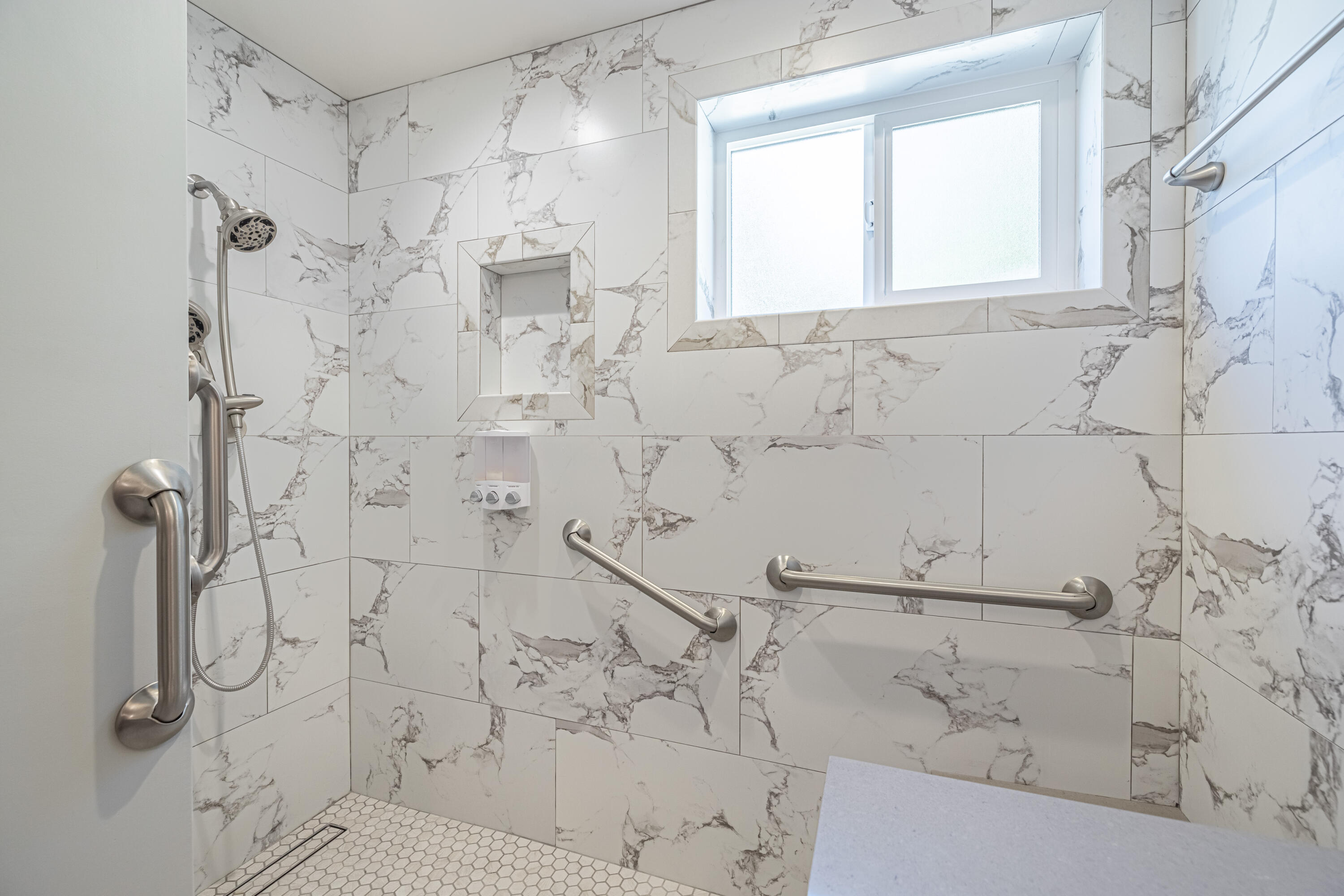 43733 Fenner Avenue Lancaster, CA 93536 - Photo 12 of 48 a bathroom with a shower