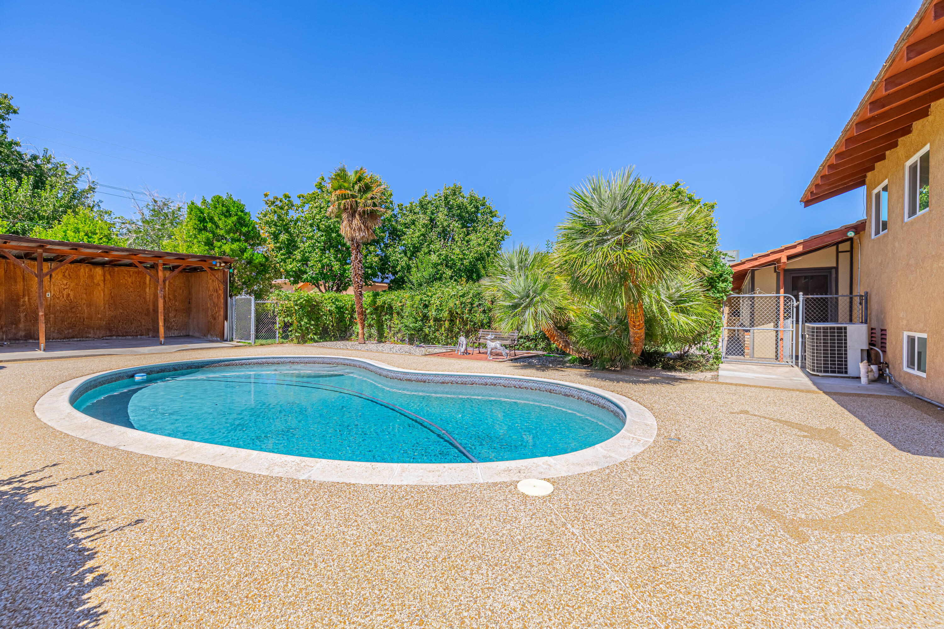 43733 Fenner Avenue Lancaster, CA 93536 - Photo 2 of 48 a view of outdoor space and swimming pool