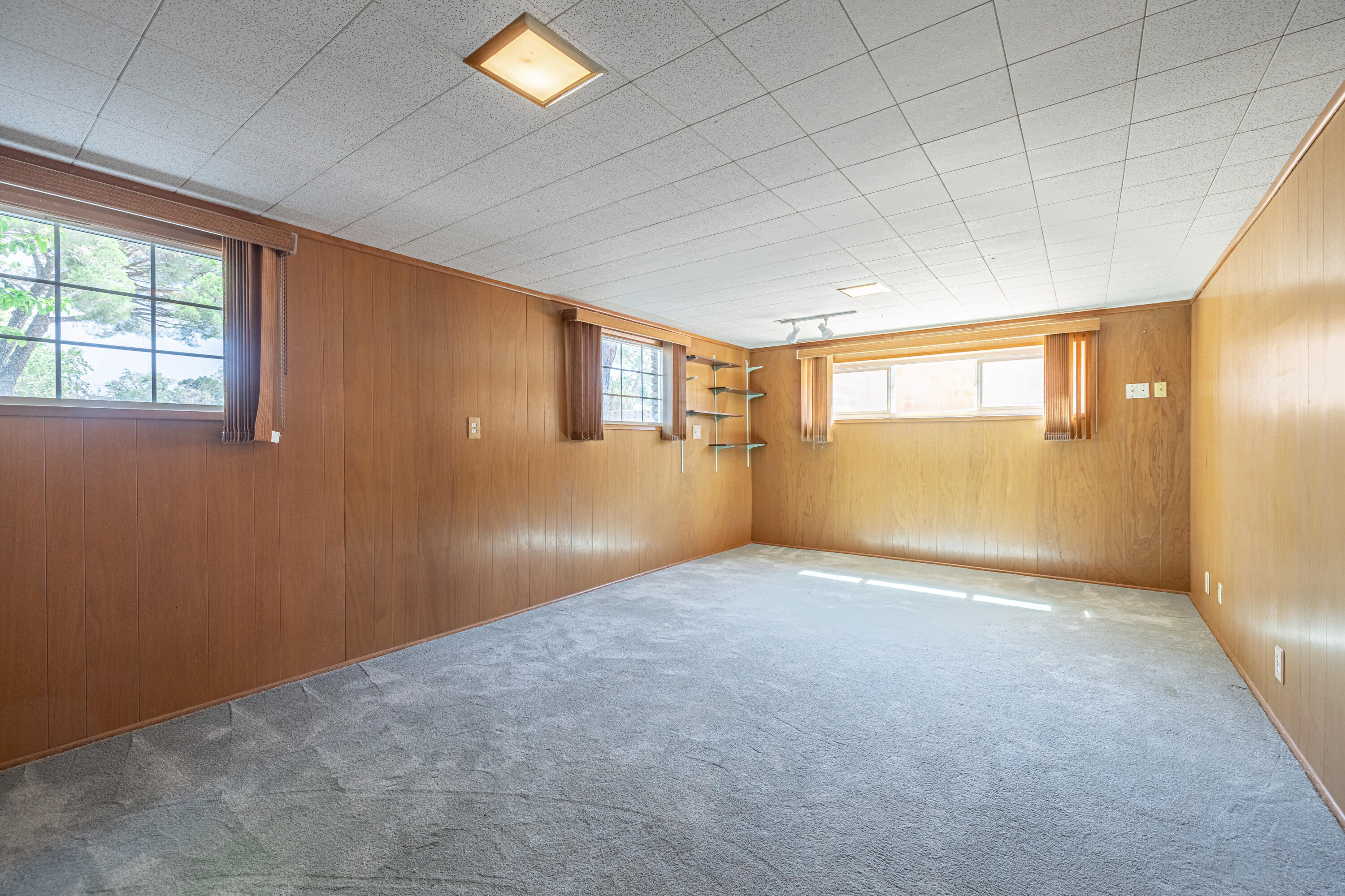 43733 Fenner Avenue Lancaster, CA 93536 - Photo 27 of 48 an empty room with a empty space and windows