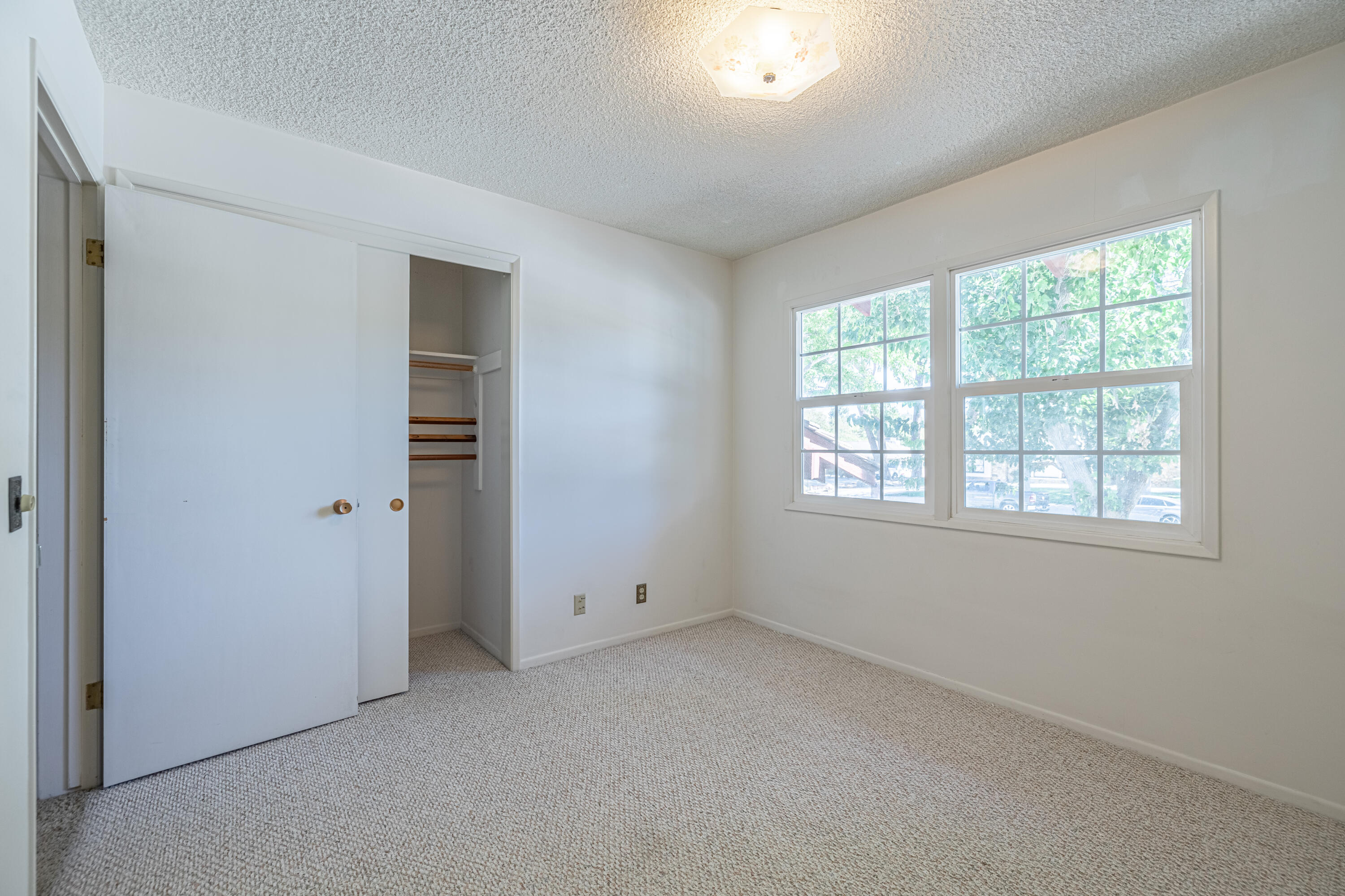 43733 Fenner Avenue Lancaster, CA 93536 - Photo 29 of 48 an empty room with windows