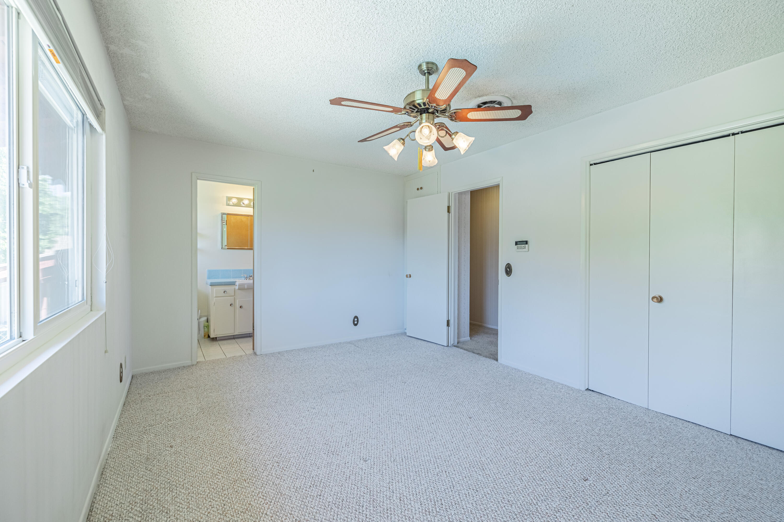 43733 Fenner Avenue Lancaster, CA 93536 - Photo 31 of 48 a view of an empty room with a window