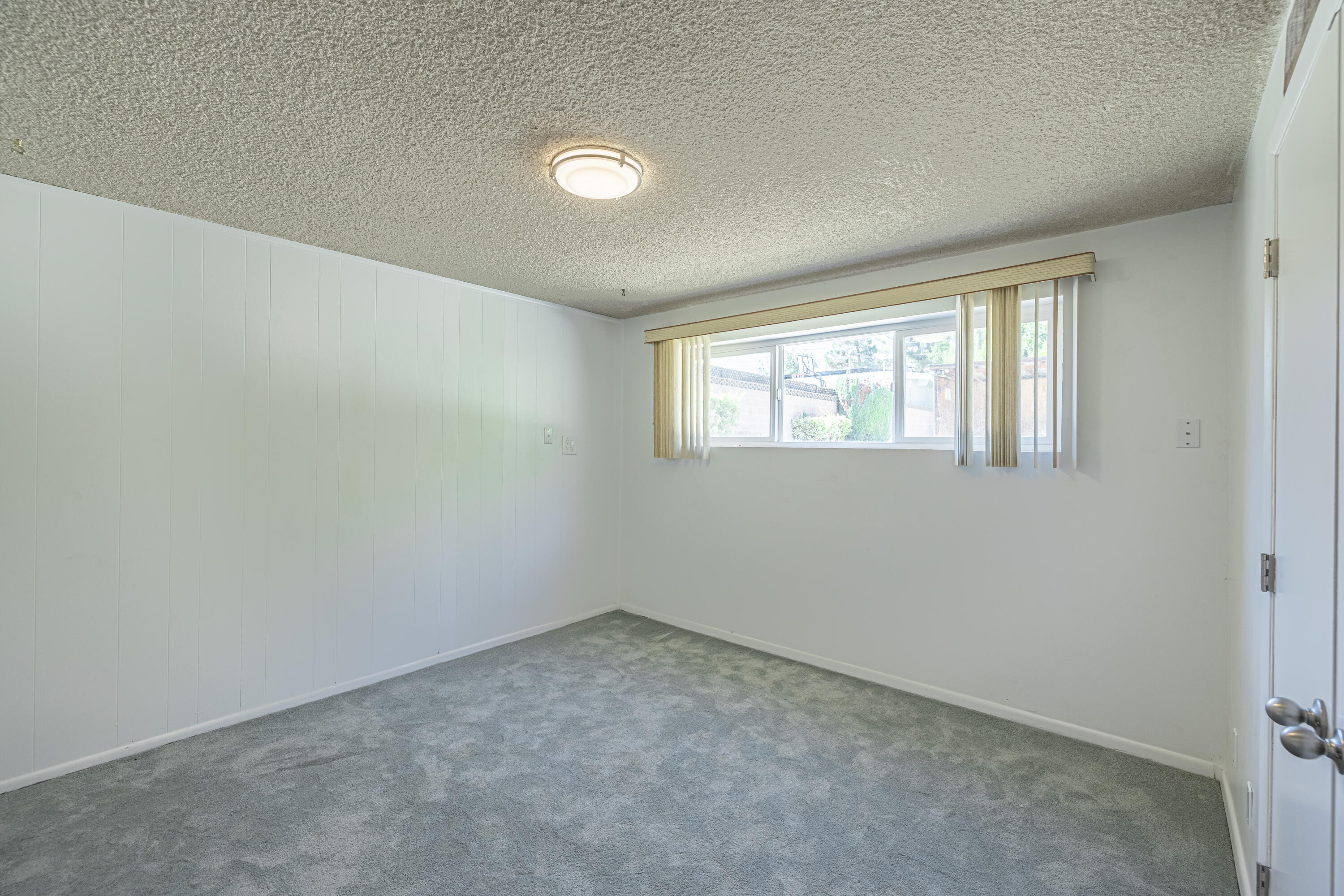43733 Fenner Avenue Lancaster, CA 93536 - Photo 36 of 48 an empty room with windows