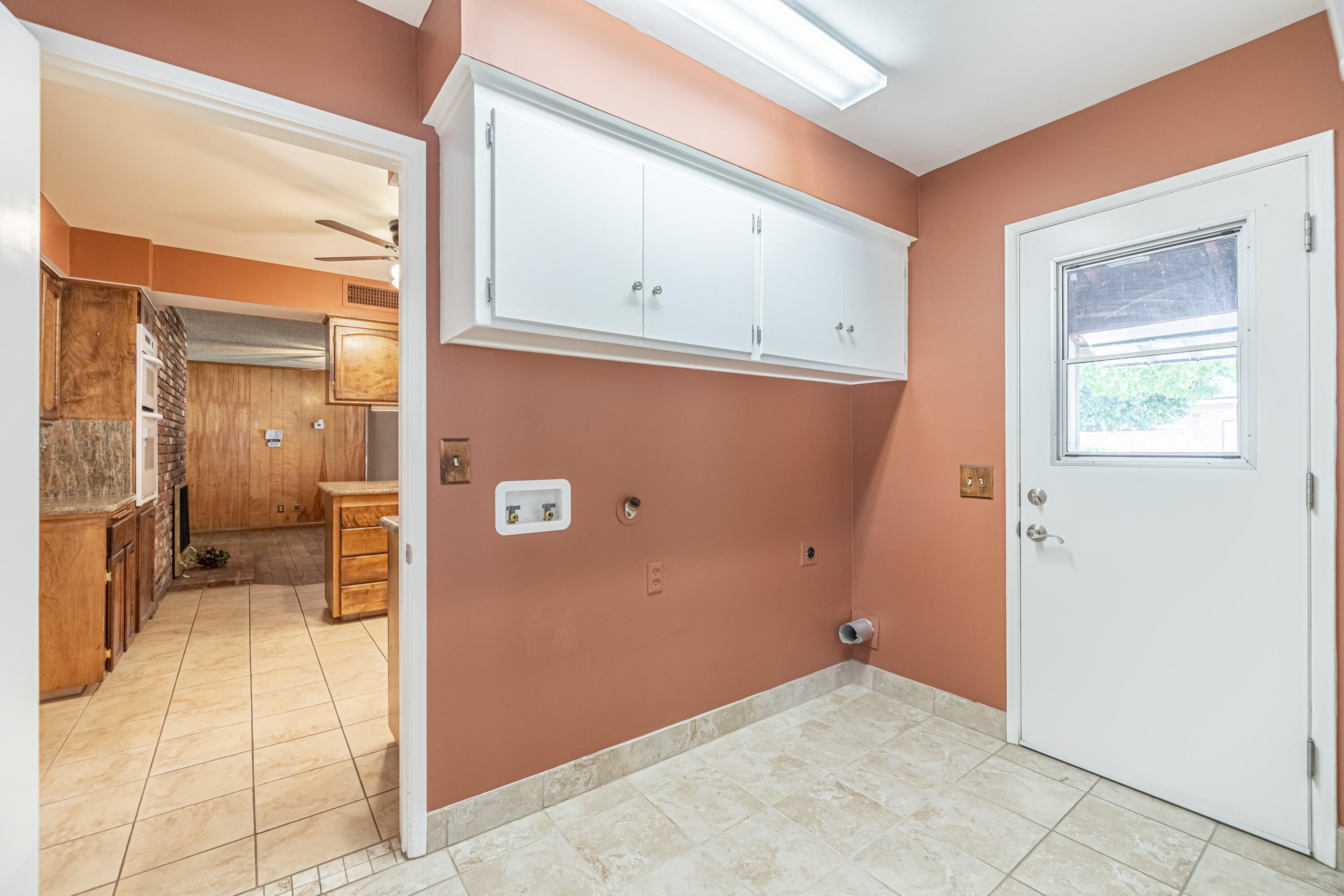 43733 Fenner Avenue Lancaster, CA 93536 - Photo 40 of 48 a view of a kitchen with a fridge