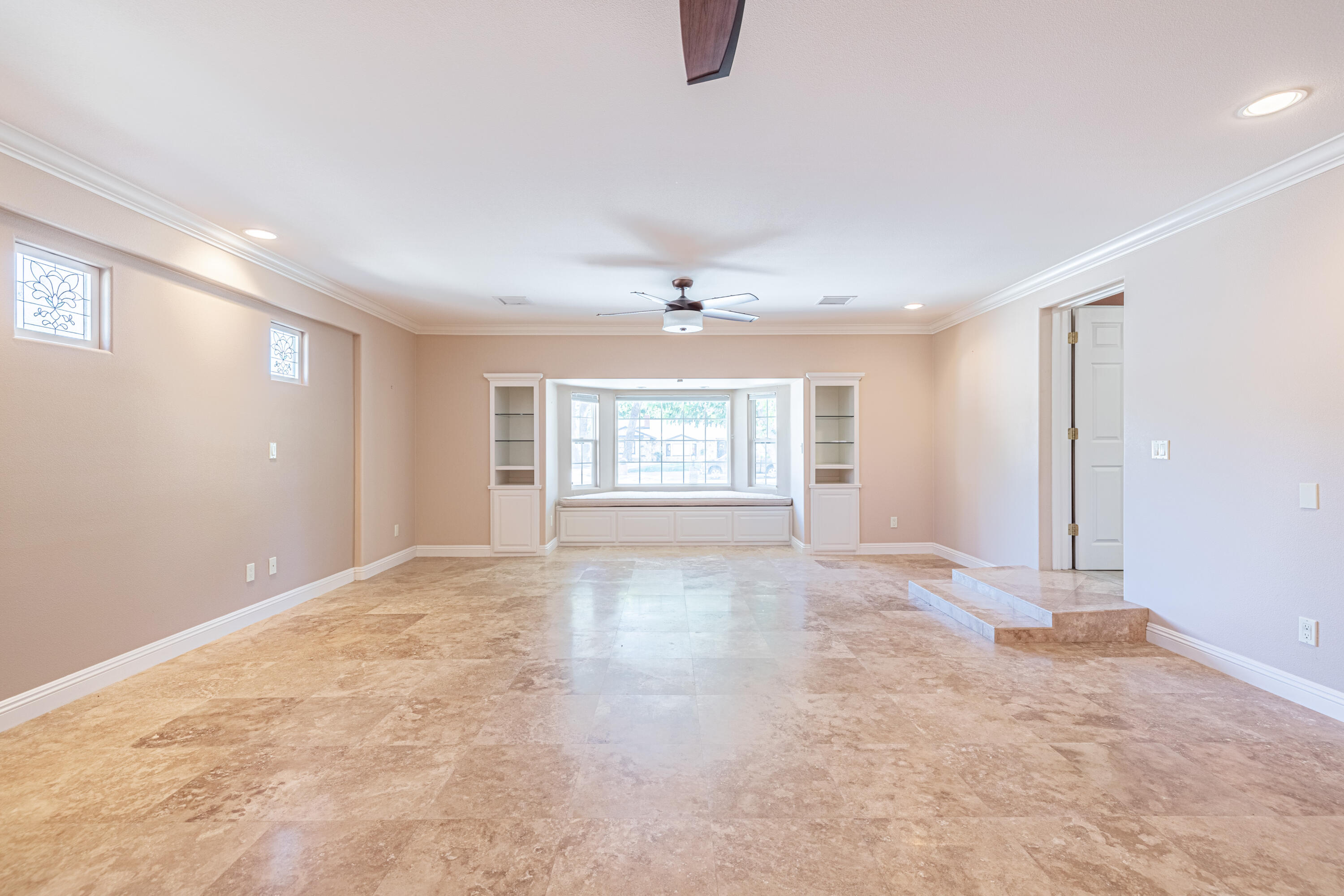 43733 Fenner Avenue Lancaster, CA 93536 - Photo 6 of 48 a view of an empty room with a window