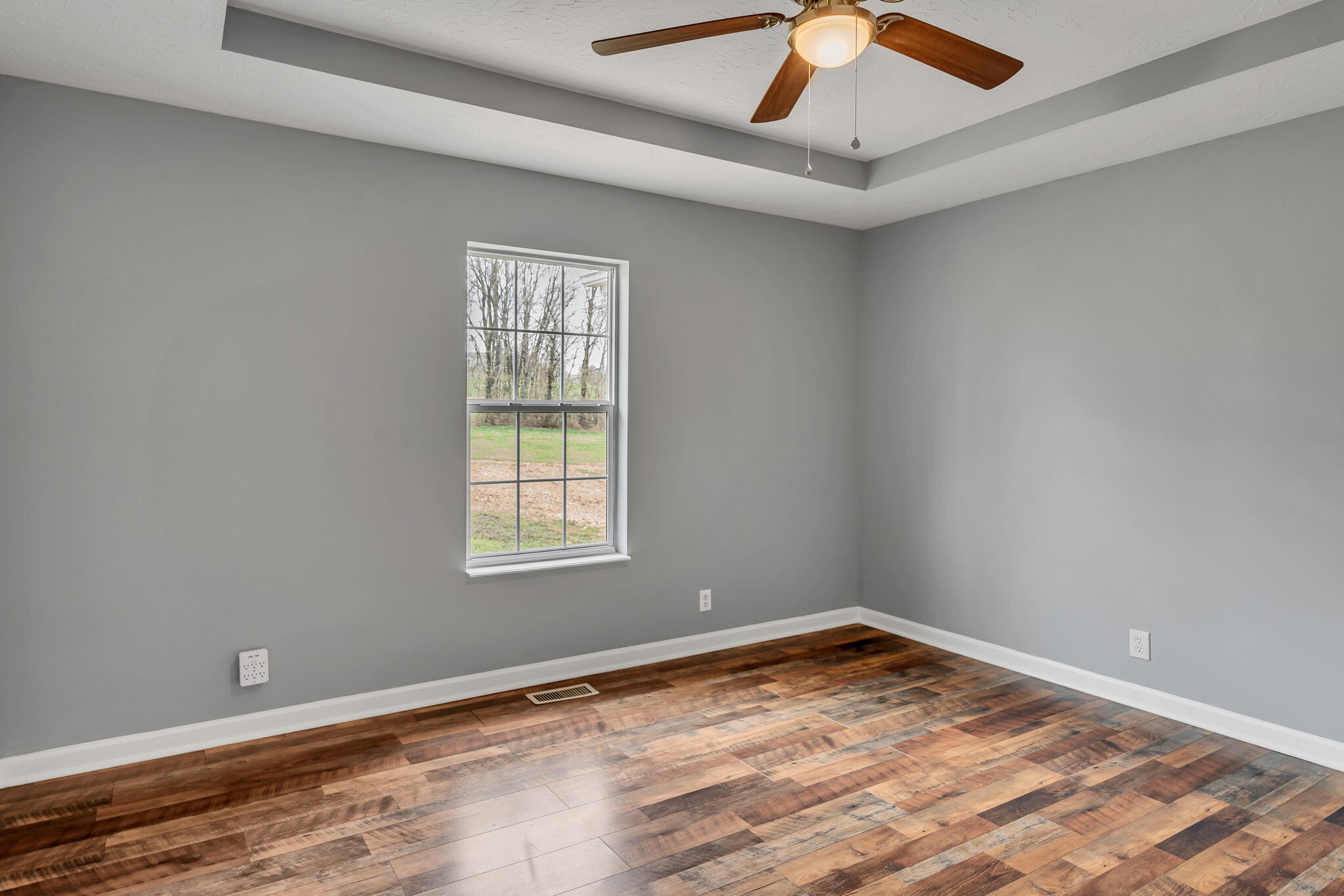 3716 Dobbin Road Springfield, TN 37172 - Photo 17 of 34 a view of empty room with wooden floor and fan