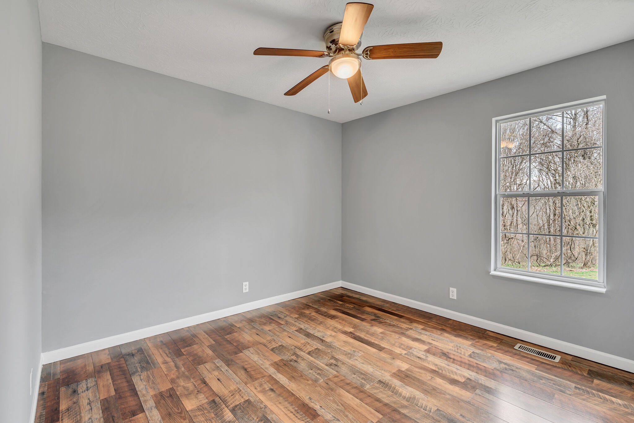 3716 Dobbin Road Springfield, TN 37172 - Photo 24 of 34 an empty room with windows and fan