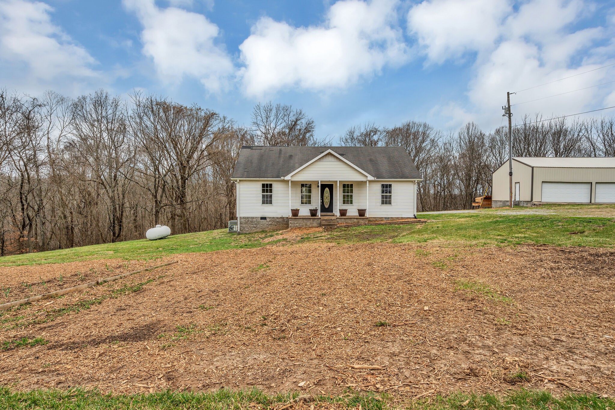 3716 Dobbin Road Springfield, TN 37172 - Photo 4 of 34 a house with garden in front of it