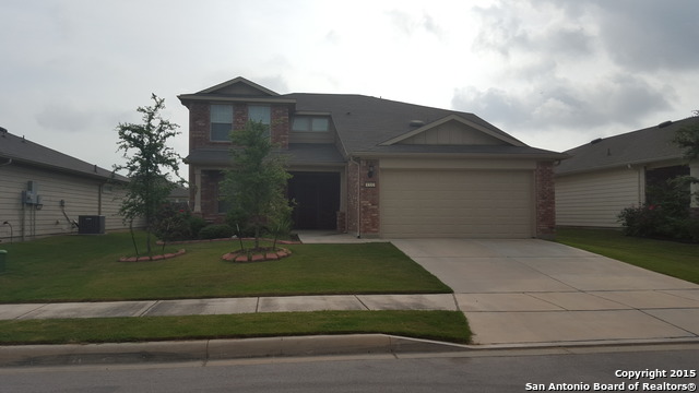 1332 Wagon Wheel Schertz, TX 78154 - Photo 1 of 21 a front view of a house with a yard and garage