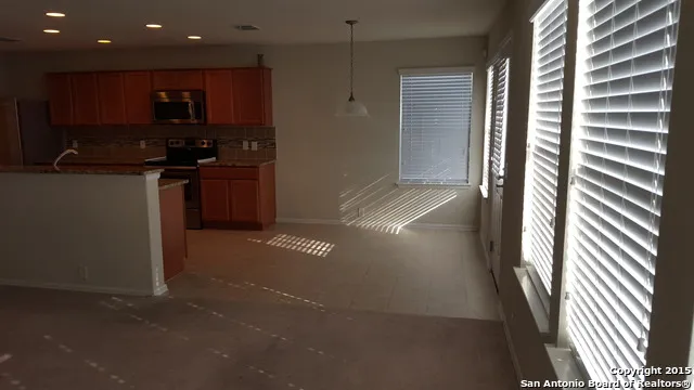 a view of kitchen and utility room