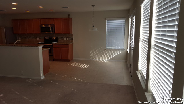 1332 Wagon Wheel Schertz, TX 78154 - Photo 13 of 21 a view of kitchen and utility room