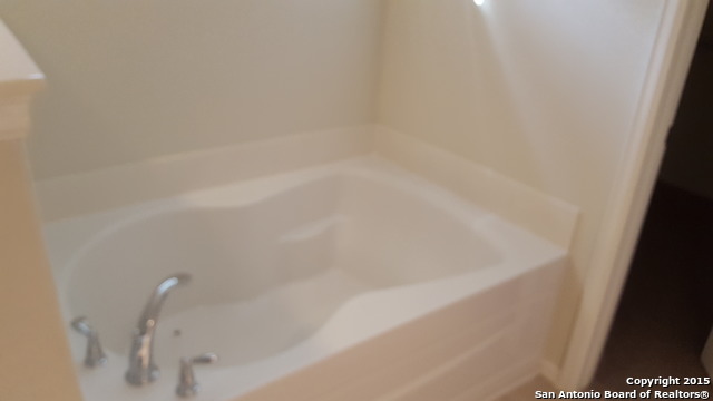 1332 Wagon Wheel Schertz, TX 78154 - Photo 17 of 21 a bathroom with a bathtub
