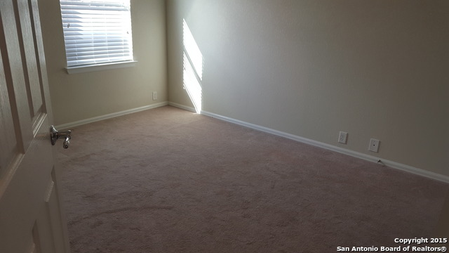 1332 Wagon Wheel Schertz, TX 78154 - Photo 20 of 21 a view of an empty room with a window
