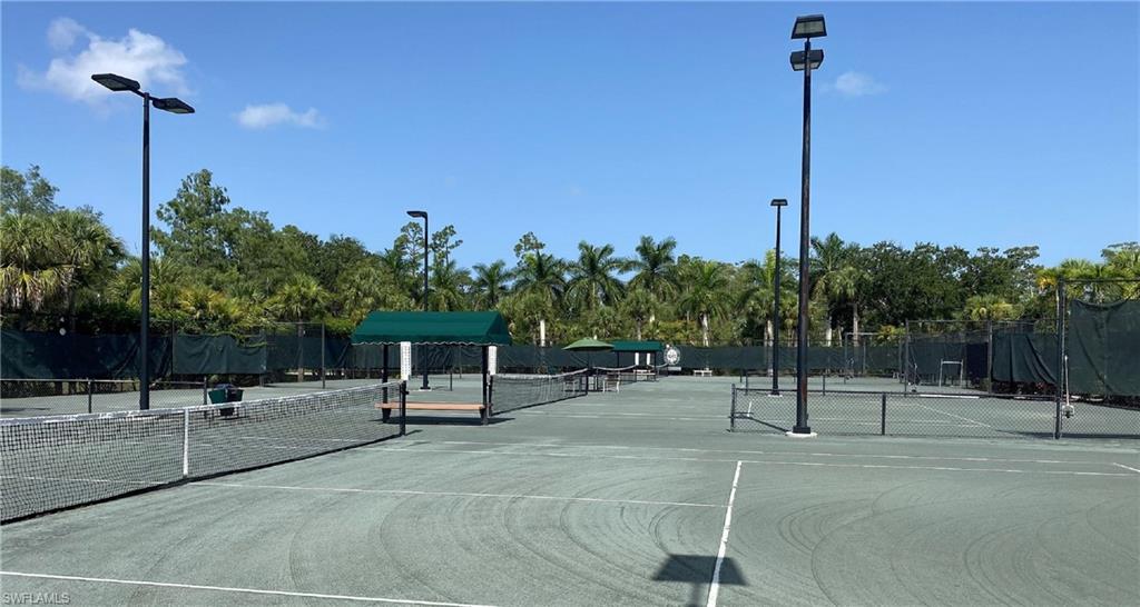 4675 Winged Foot Court, Unit 102 Naples, FL 34114 - Photo 31 of 31 a view of a park with a tree