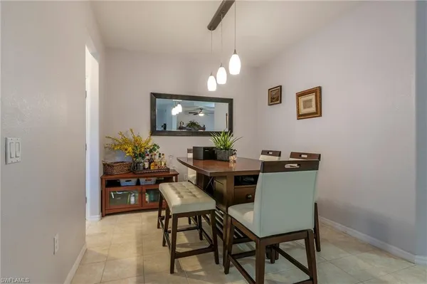 a view of a dining room with furniture