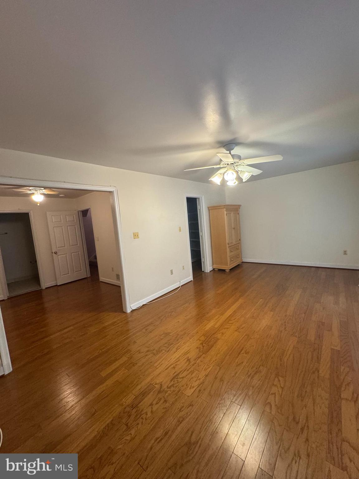 652 Currant Court, Unit 652 La Plata, MD 20646 - Photo 16 of 50 an empty room with wooden floor and windows