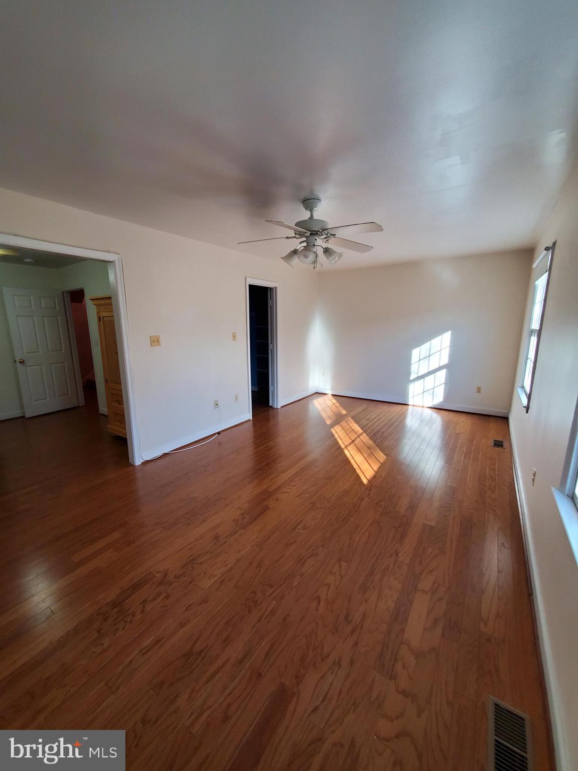 652 Currant Court, Unit 652 La Plata, MD 20646 - Photo 17 of 50 a view of an empty room with wooden floor