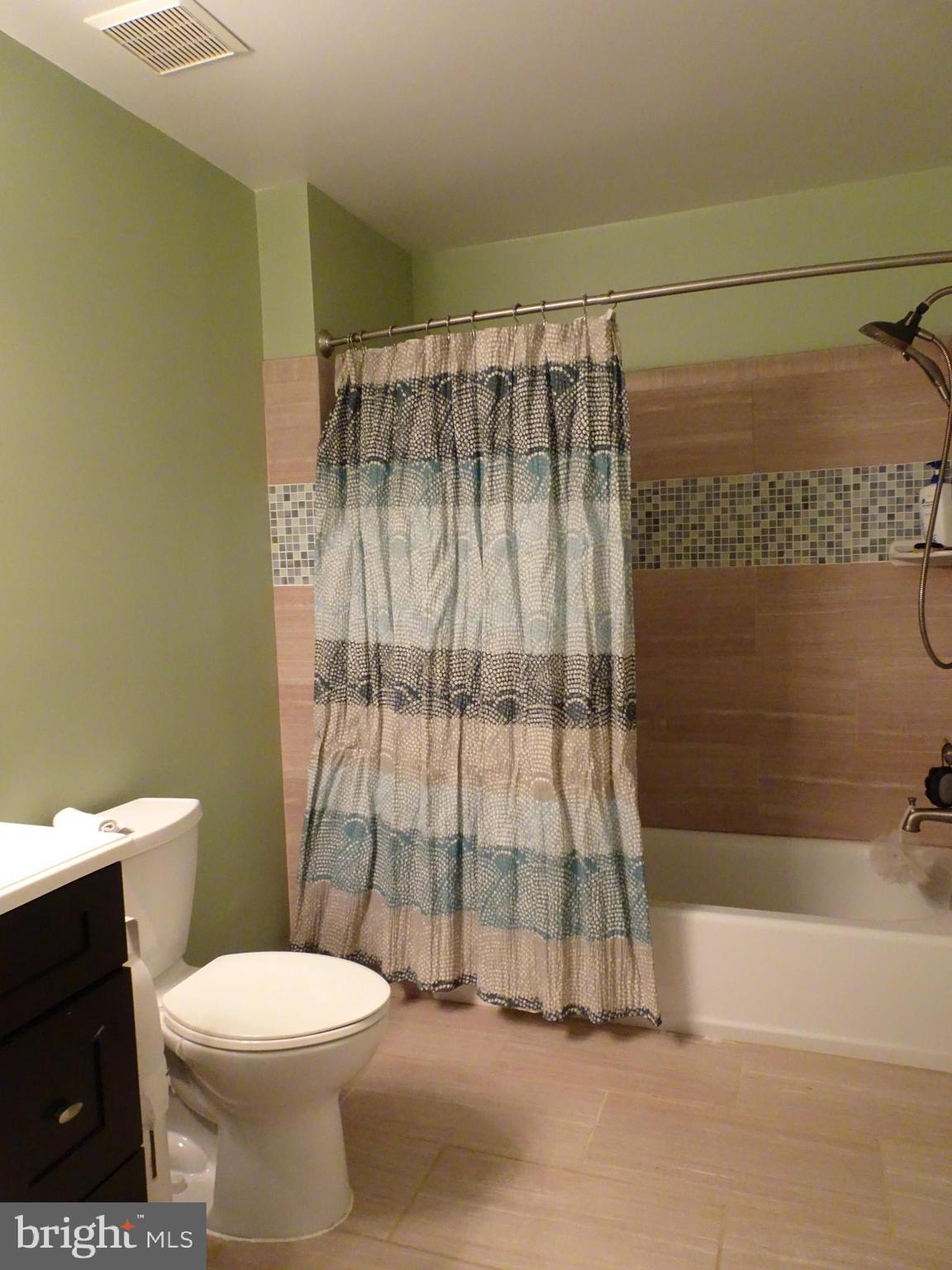 652 Currant Court, Unit 652 La Plata, MD 20646 - Photo 26 of 50 a bathroom with a toilet and shower