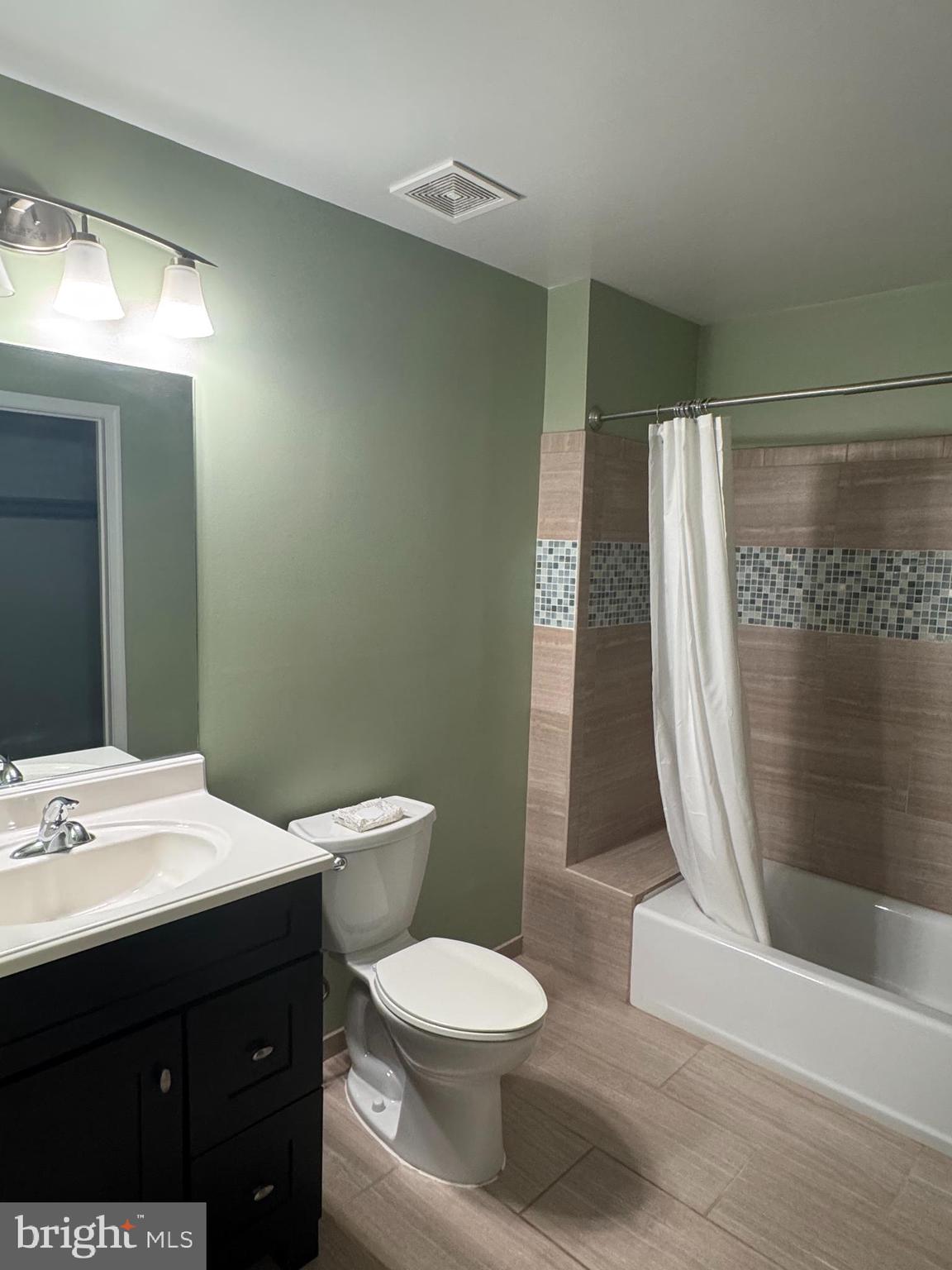 652 Currant Court, Unit 652 La Plata, MD 20646 - Photo 33 of 50 a bathroom with a sink a toilet and shower
