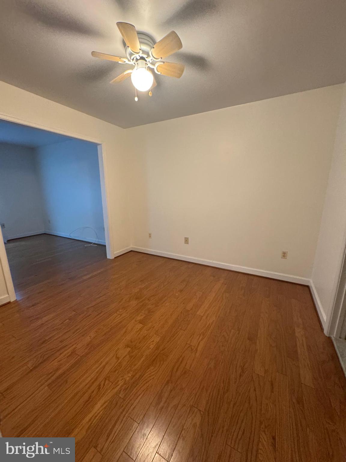 652 Currant Court, Unit 652 La Plata, MD 20646 - Photo 43 of 50 an empty room with wooden floor and fan