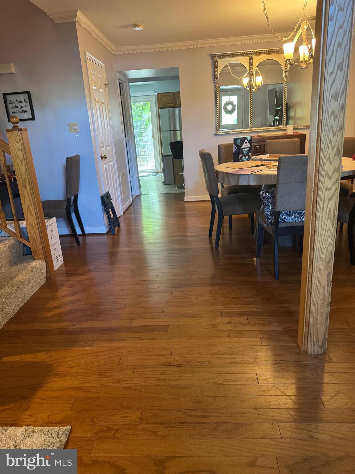 652 Currant Court, Unit 652 La Plata, MD 20646 - Photo 7 of 50 a view of a dining room with furniture and wooden floor