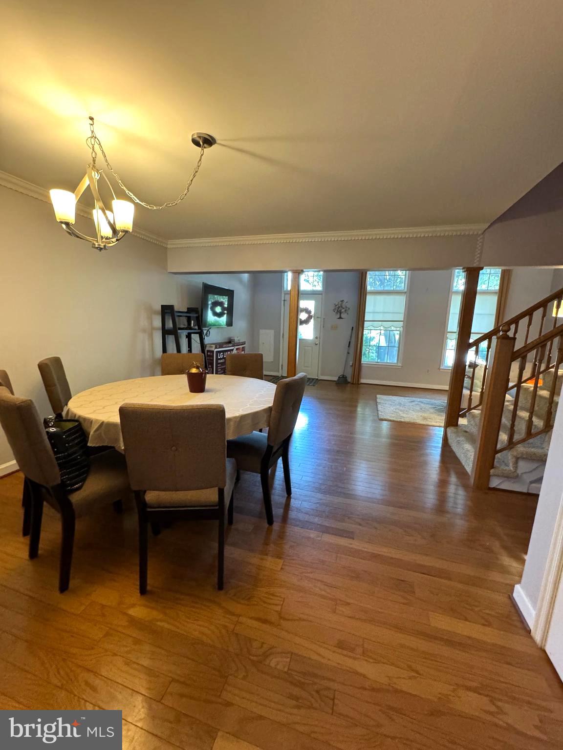 652 Currant Court, Unit 652 La Plata, MD 20646 - Photo 9 of 50 a view of a dining room with furniture and wooden floor