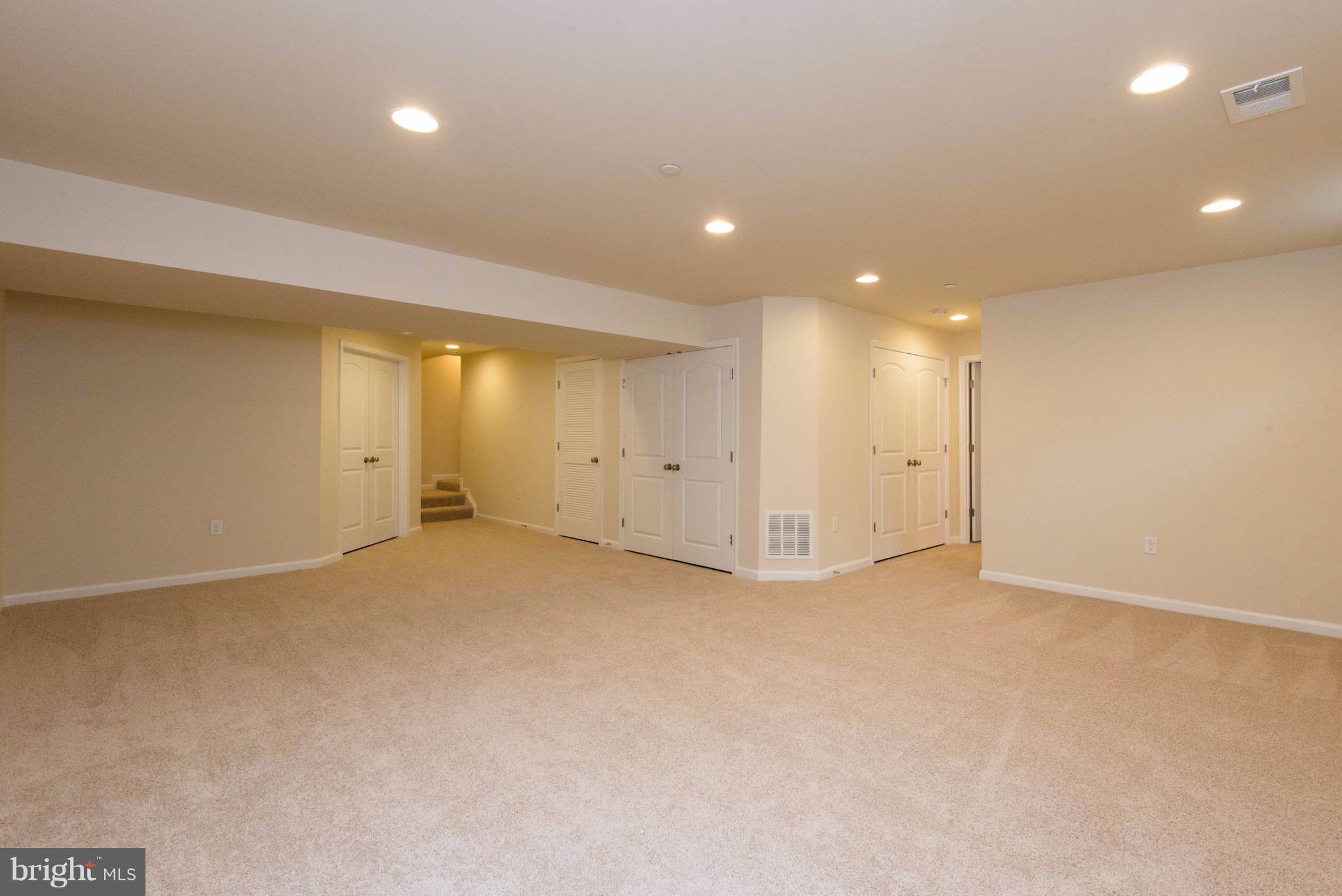 8115 Ridgely Loop Severn, MD 21144 - Photo 28 of 30 Rec Room