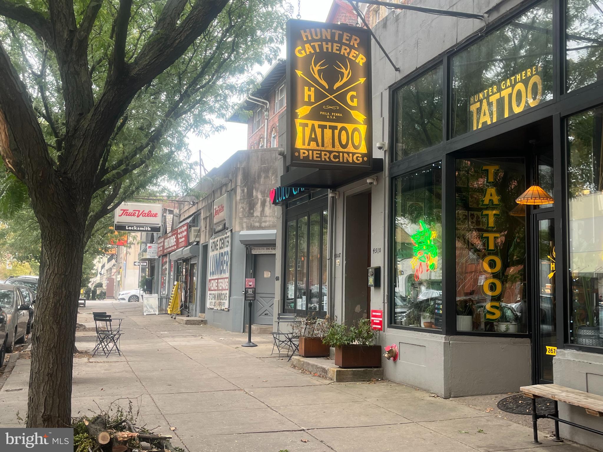 4508 Walnut Street, Unit 404 Philadelphia, PA 19139 - Photo 1 of 18 a view of street and shops