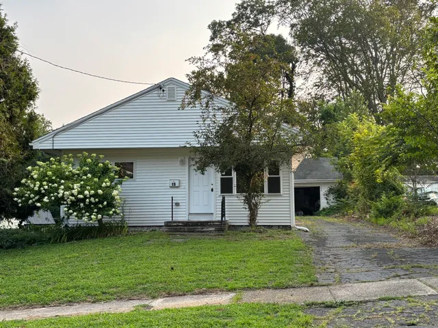 a front view of house with yard