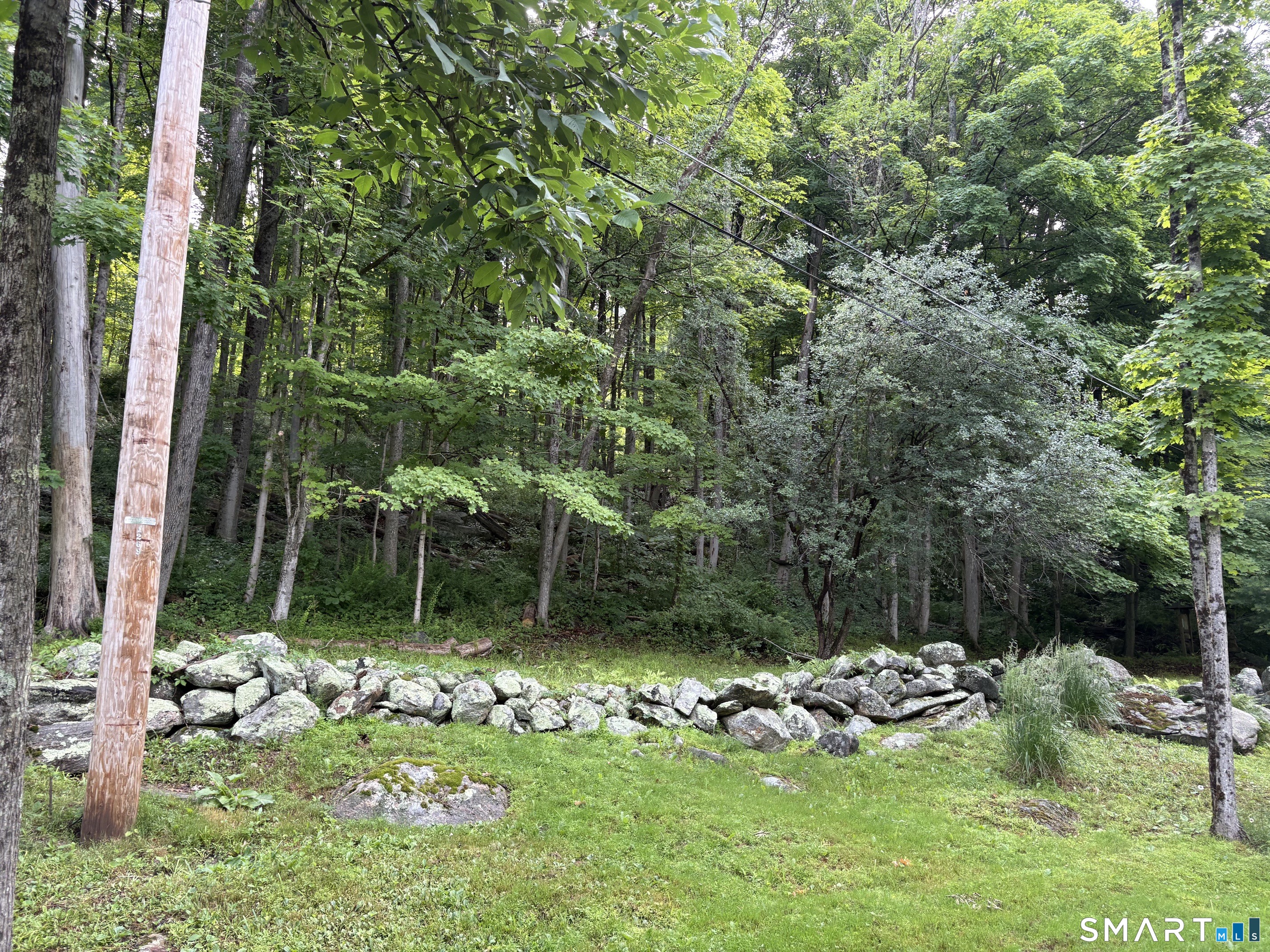 128 Popple Swamp Road Cornwall Bridge, CT 06754 - Photo 9 of 10 Electricity is already connected to the cabin but also there is power at the property line off River Road.