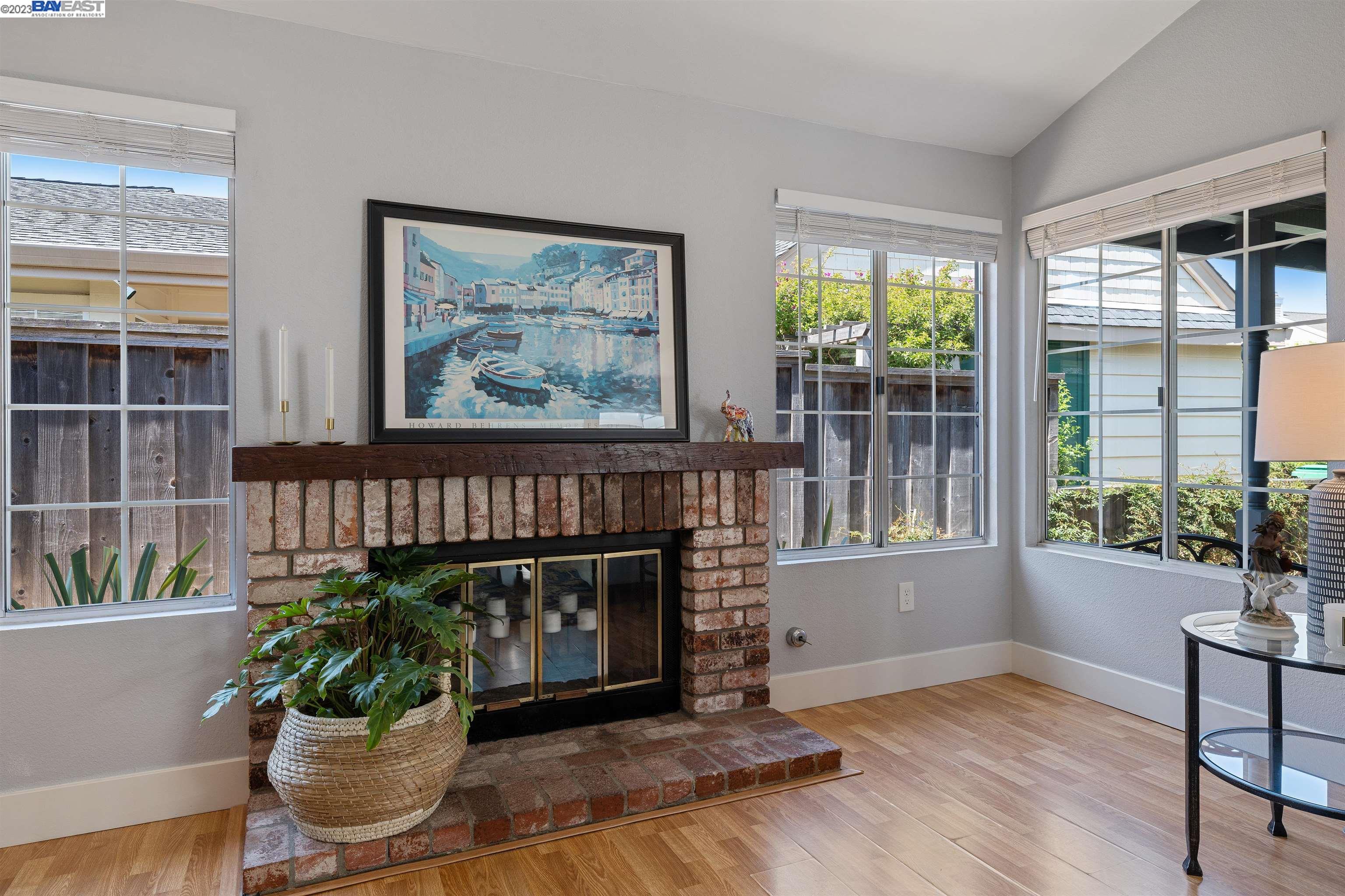 Undisclosed Address Alameda, CA 94502 - Photo 11 of 44 a living room with furniture and a potted plant