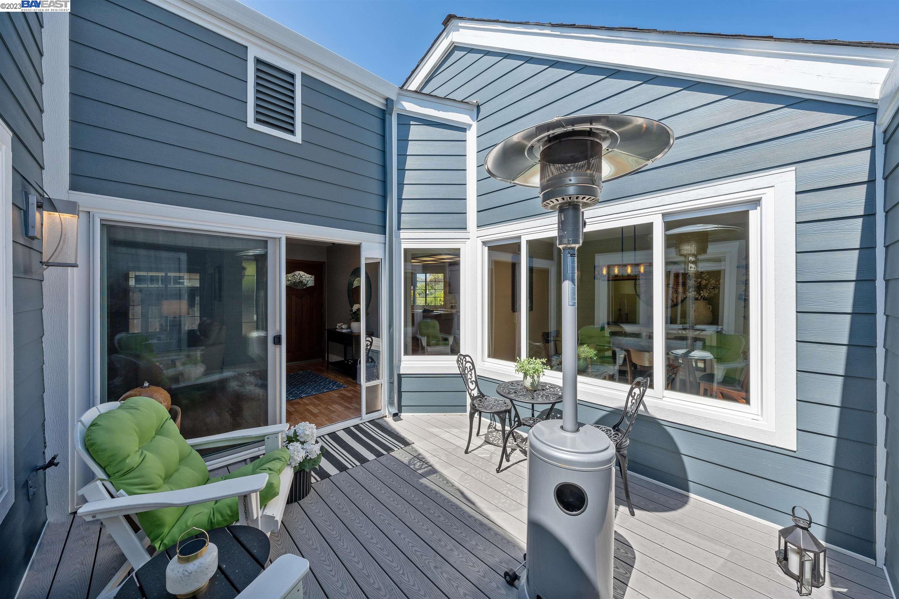 Undisclosed Address Alameda, CA 94502 - Photo 16 of 44 a view of a chairs and table in a patio