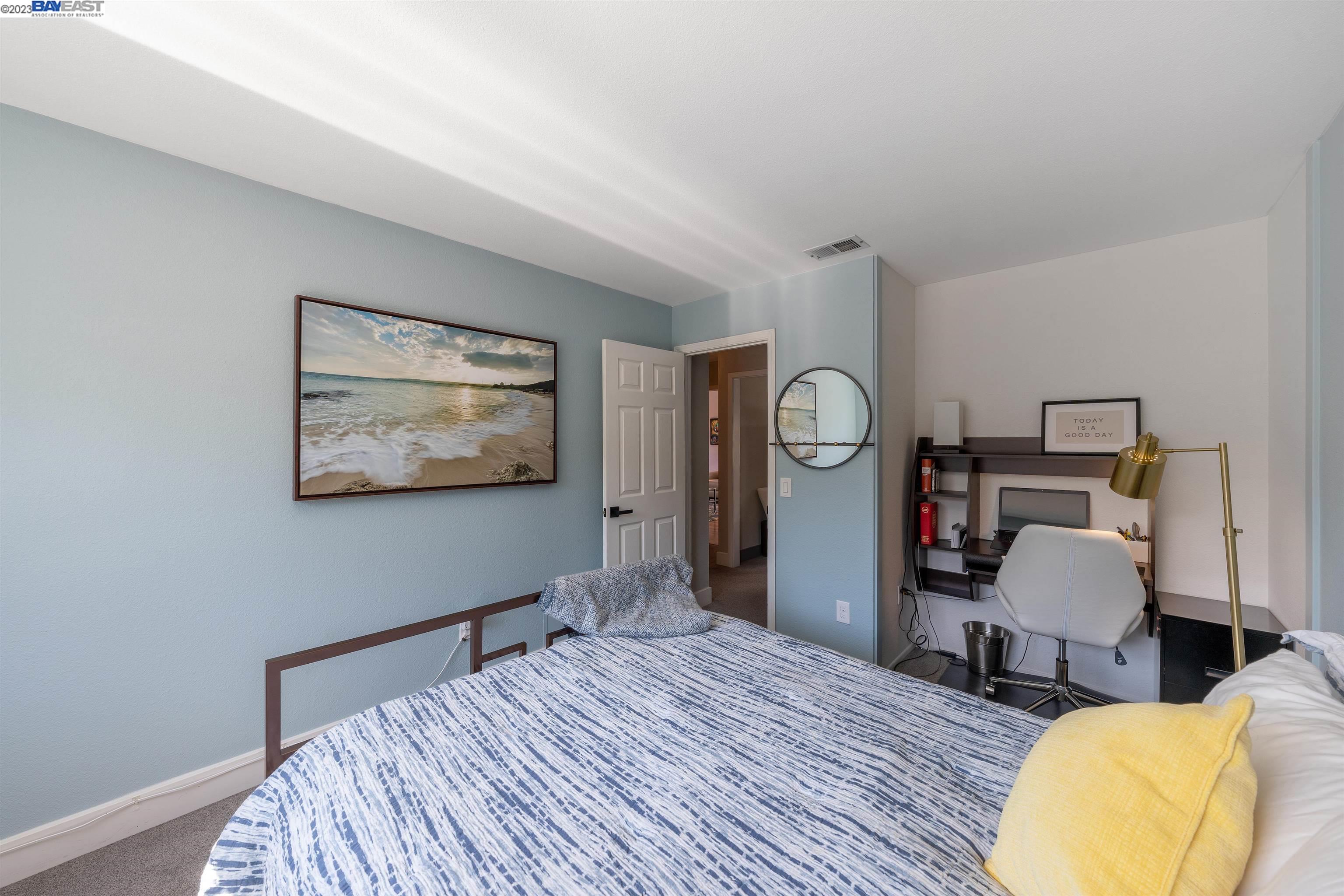 Undisclosed Address Alameda, CA 94502 - Photo 27 of 44 a bedroom with bed and a chair