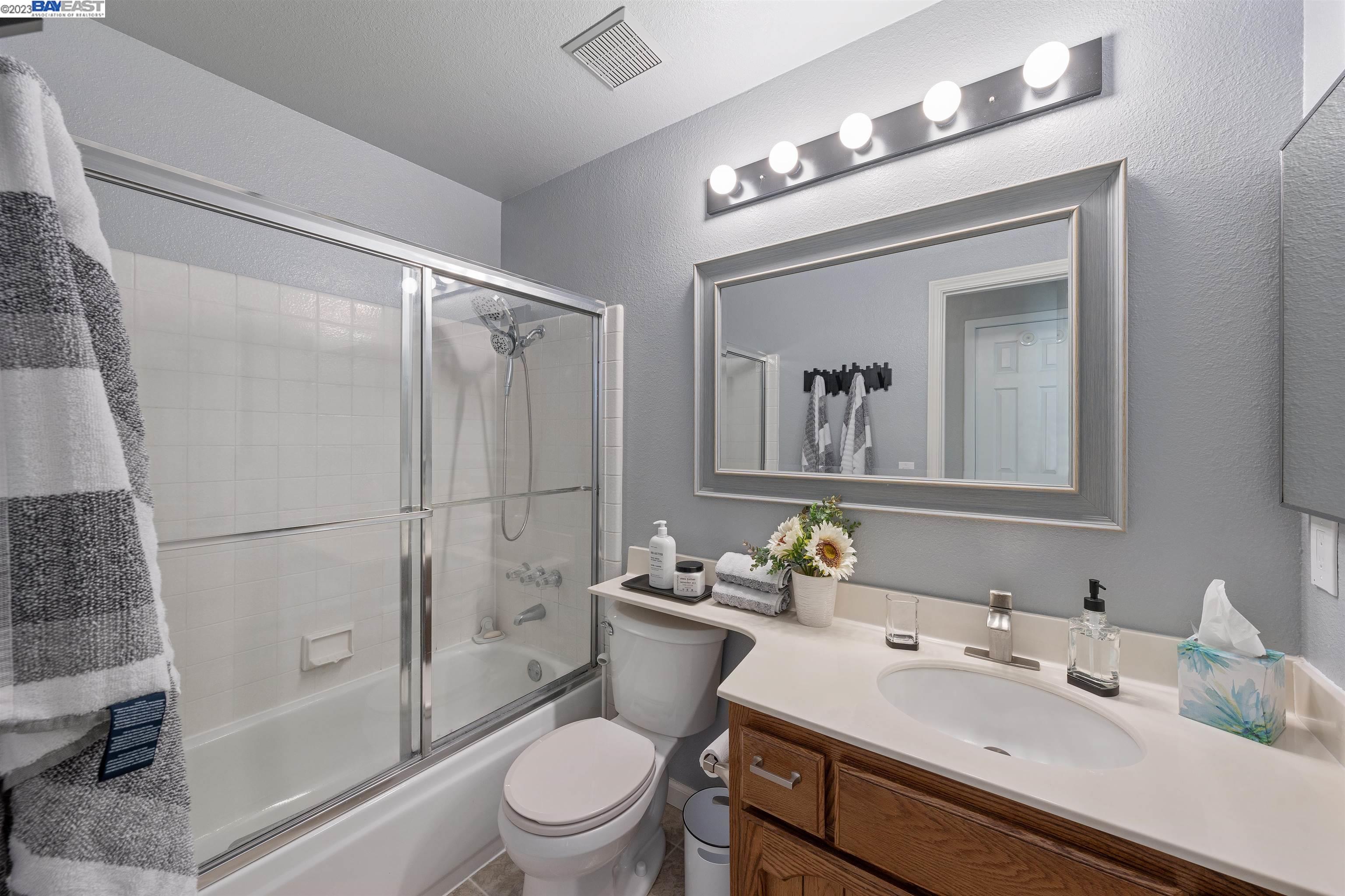 Undisclosed Address Alameda, CA 94502 - Photo 28 of 44 a bathroom with a sink toilet and shower