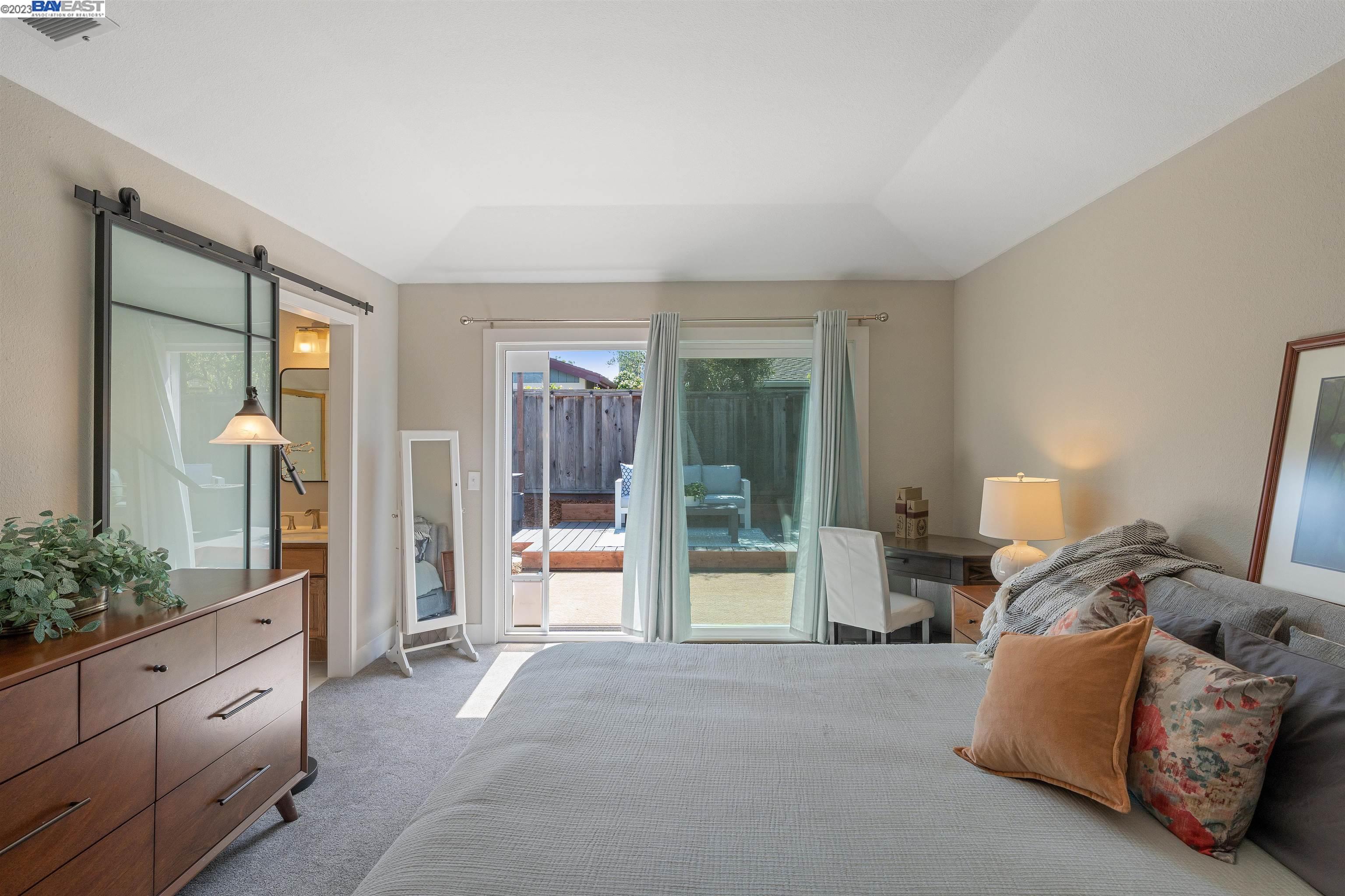 Undisclosed Address Alameda, CA 94502 - Photo 33 of 44 a living room with furniture and a large window