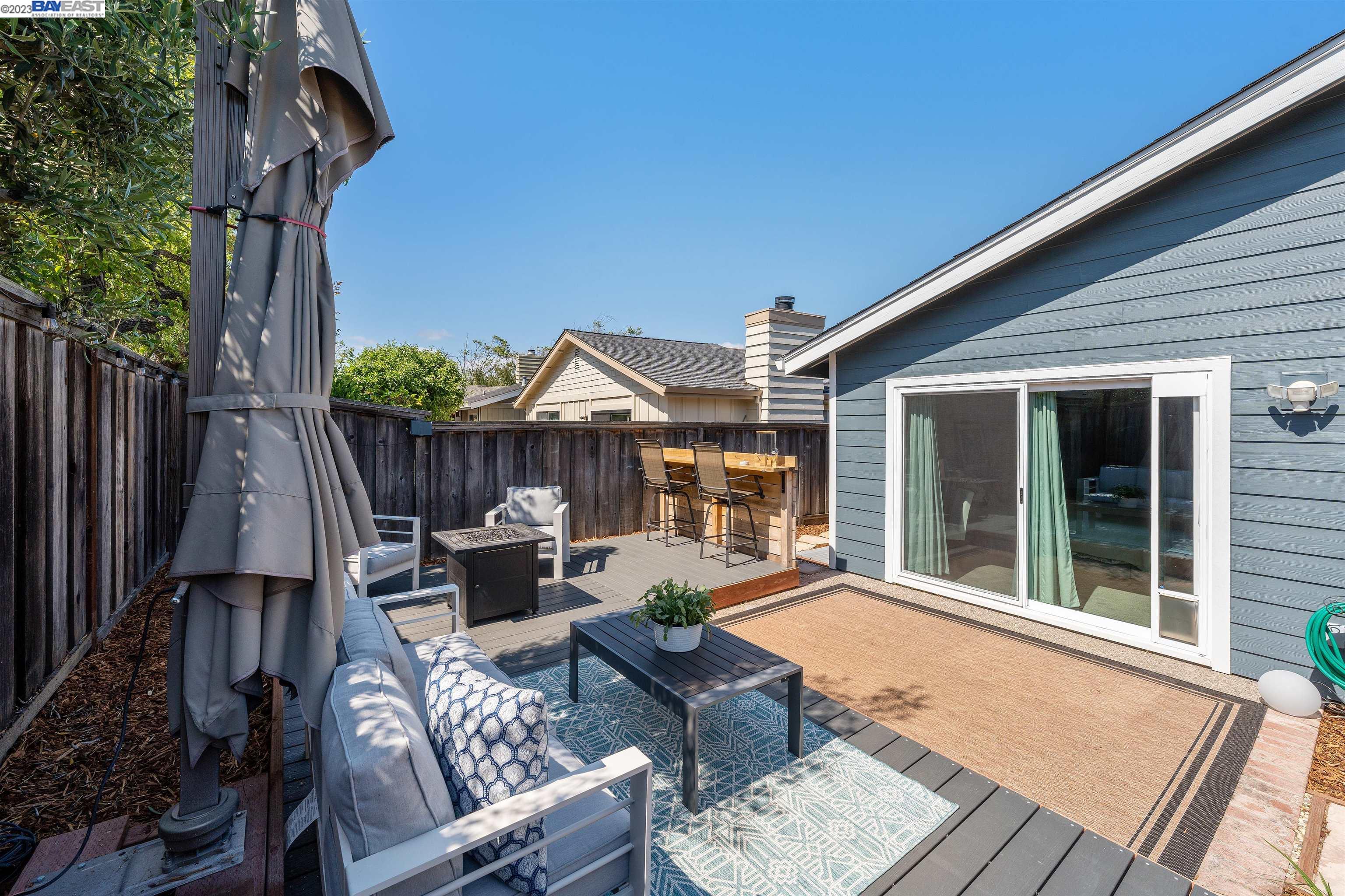 Undisclosed Address Alameda, CA 94502 - Photo 39 of 44 a view of a house with backyard and sitting area