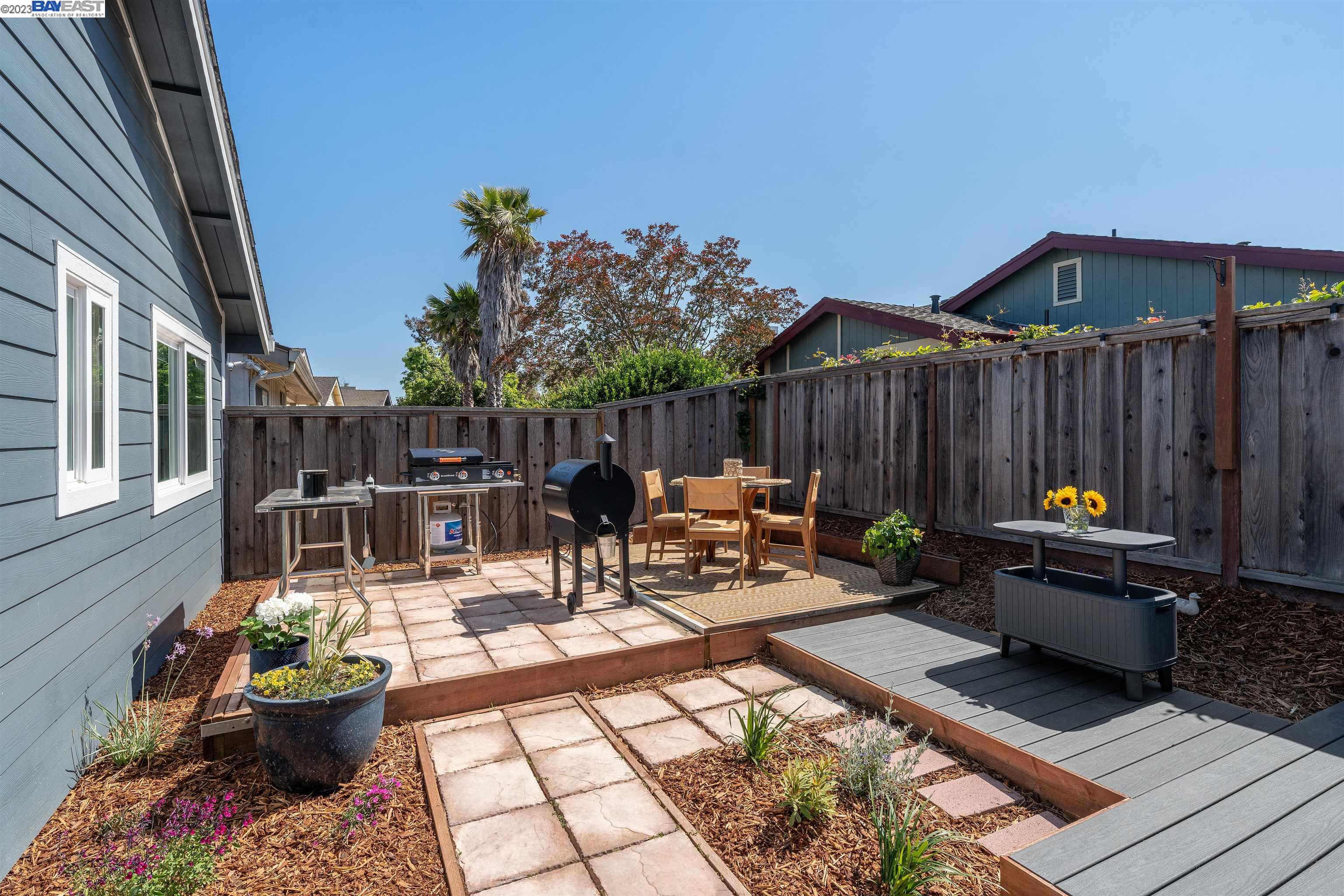 Undisclosed Address Alameda, CA 94502 - Photo 43 of 44 a outdoor space with patio couches and a potted plant