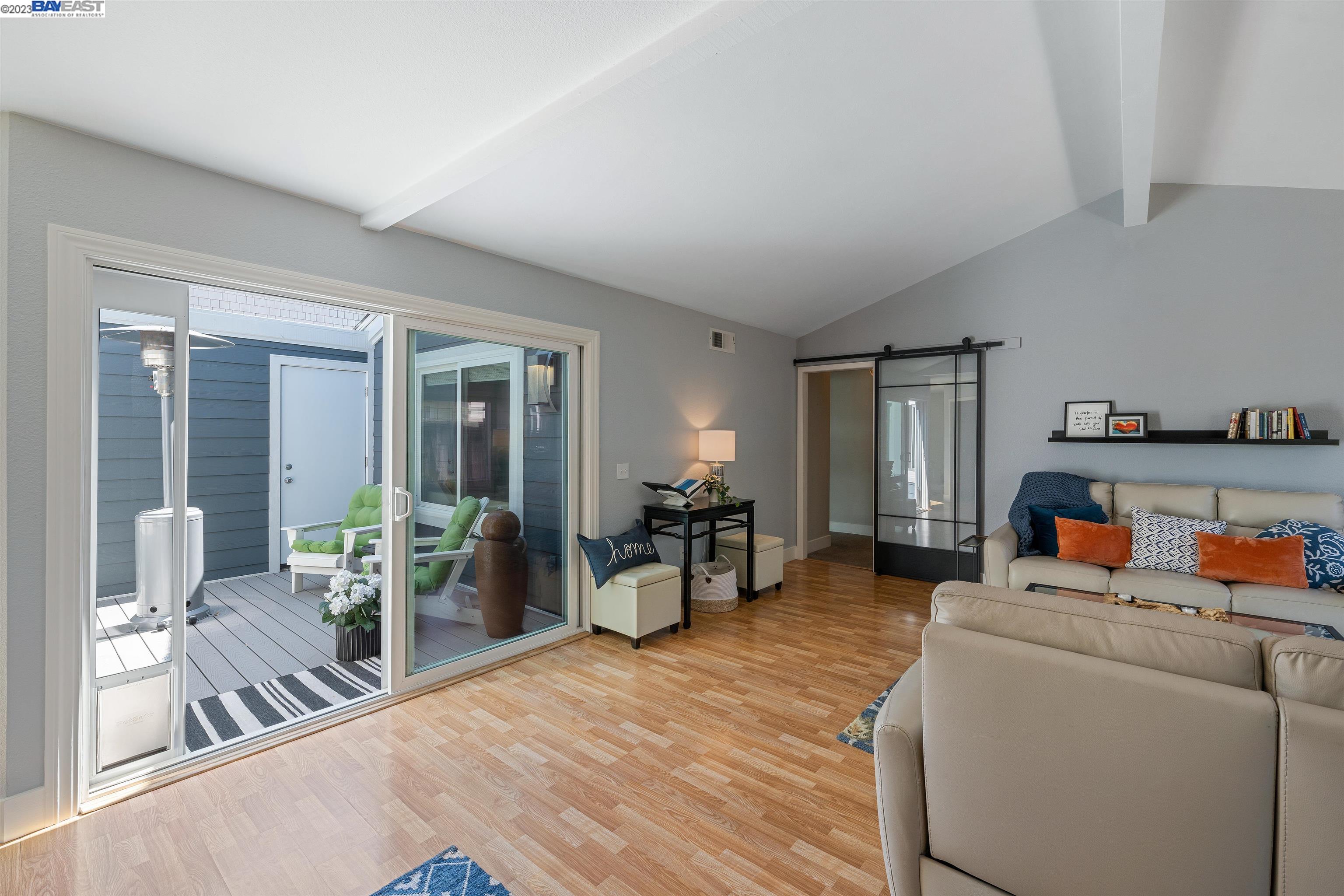 Undisclosed Address Alameda, CA 94502 - Photo 6 of 44 a living room with furniture and wooden floor