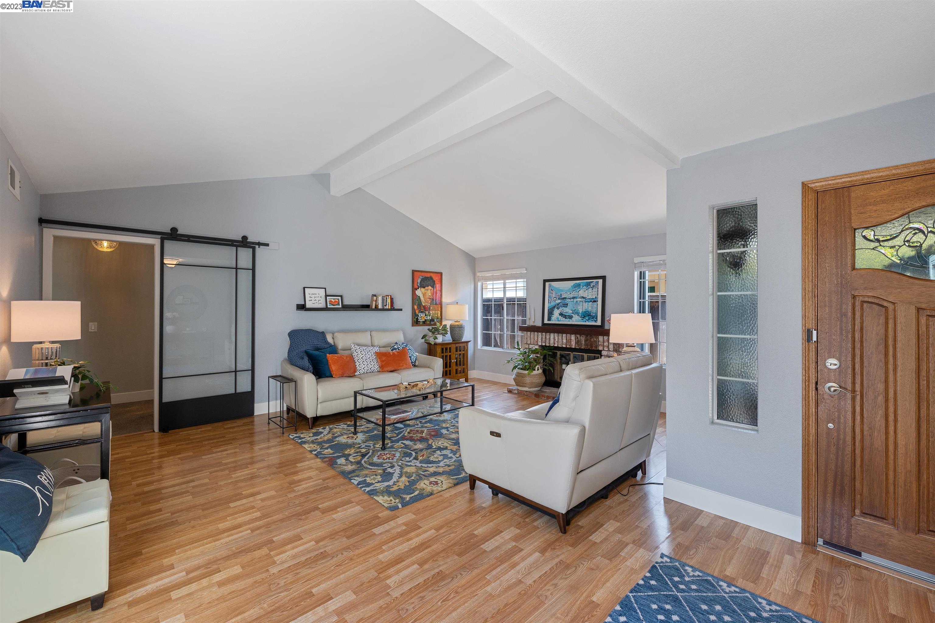Undisclosed Address Alameda, CA 94502 - Photo 7 of 44 a living room with furniture and a wooden floor