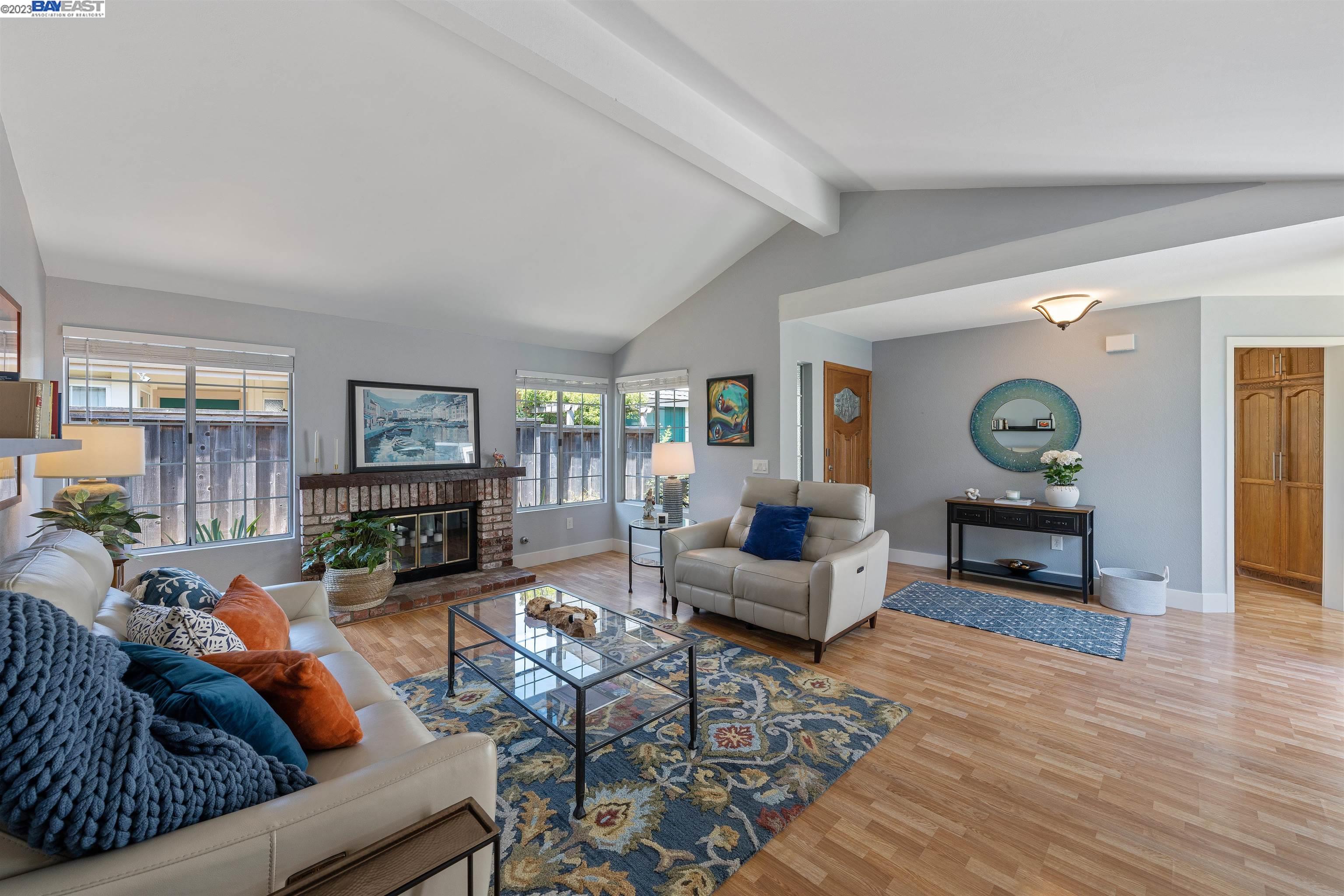 Undisclosed Address Alameda, CA 94502 - Photo 8 of 44 a living room with furniture and a fireplace