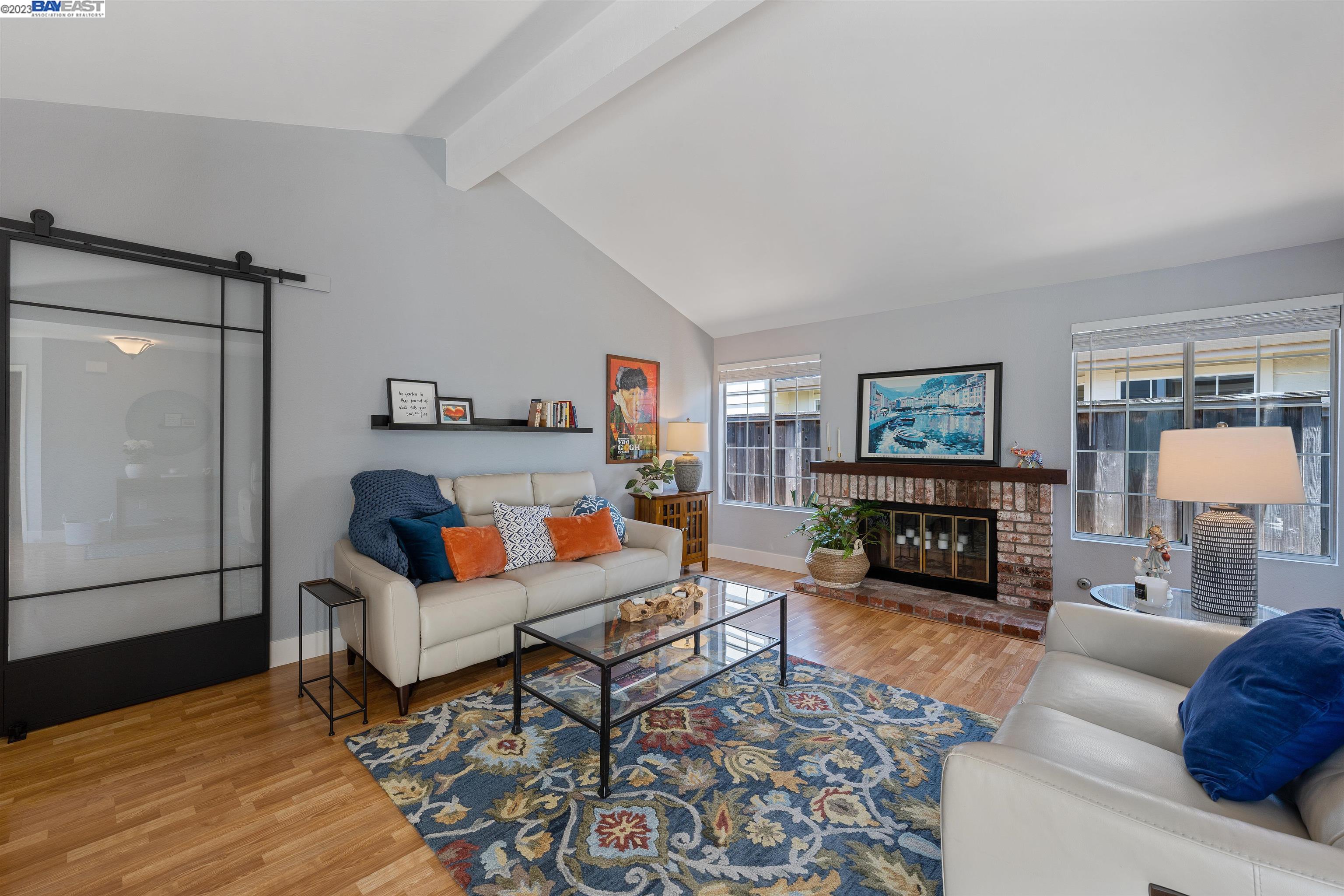 Undisclosed Address Alameda, CA 94502 - Photo 9 of 44 a living room with furniture and a fireplace