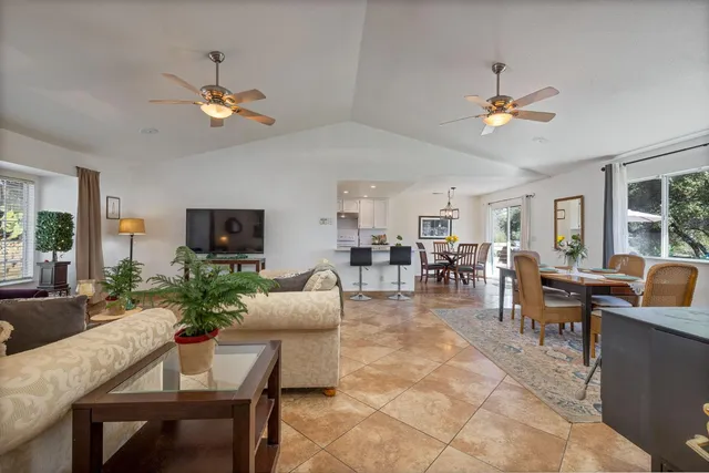 a kitchen with cabinets oven and a sink