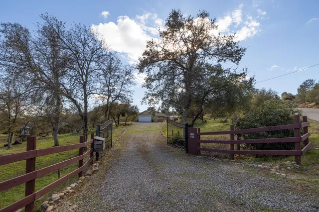 a view of a house with a garden