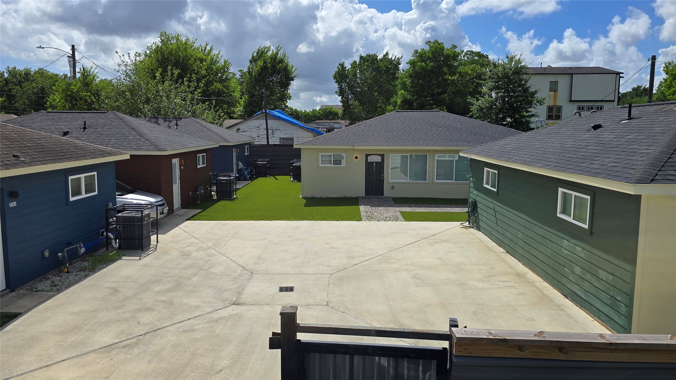 a aerial view of a house with a yard and a garage