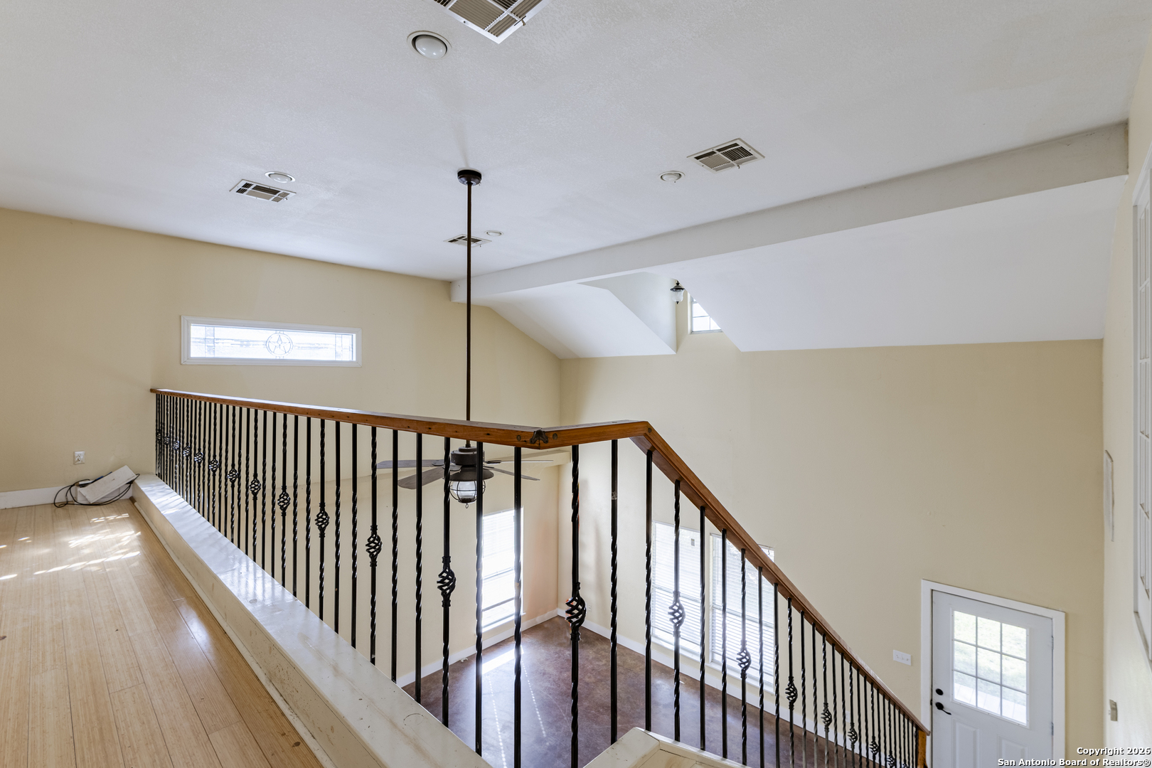 4419 State Highway 71 Columbus, TX 78934 - Photo 14 of 49 a view of staircase with railing and white walls