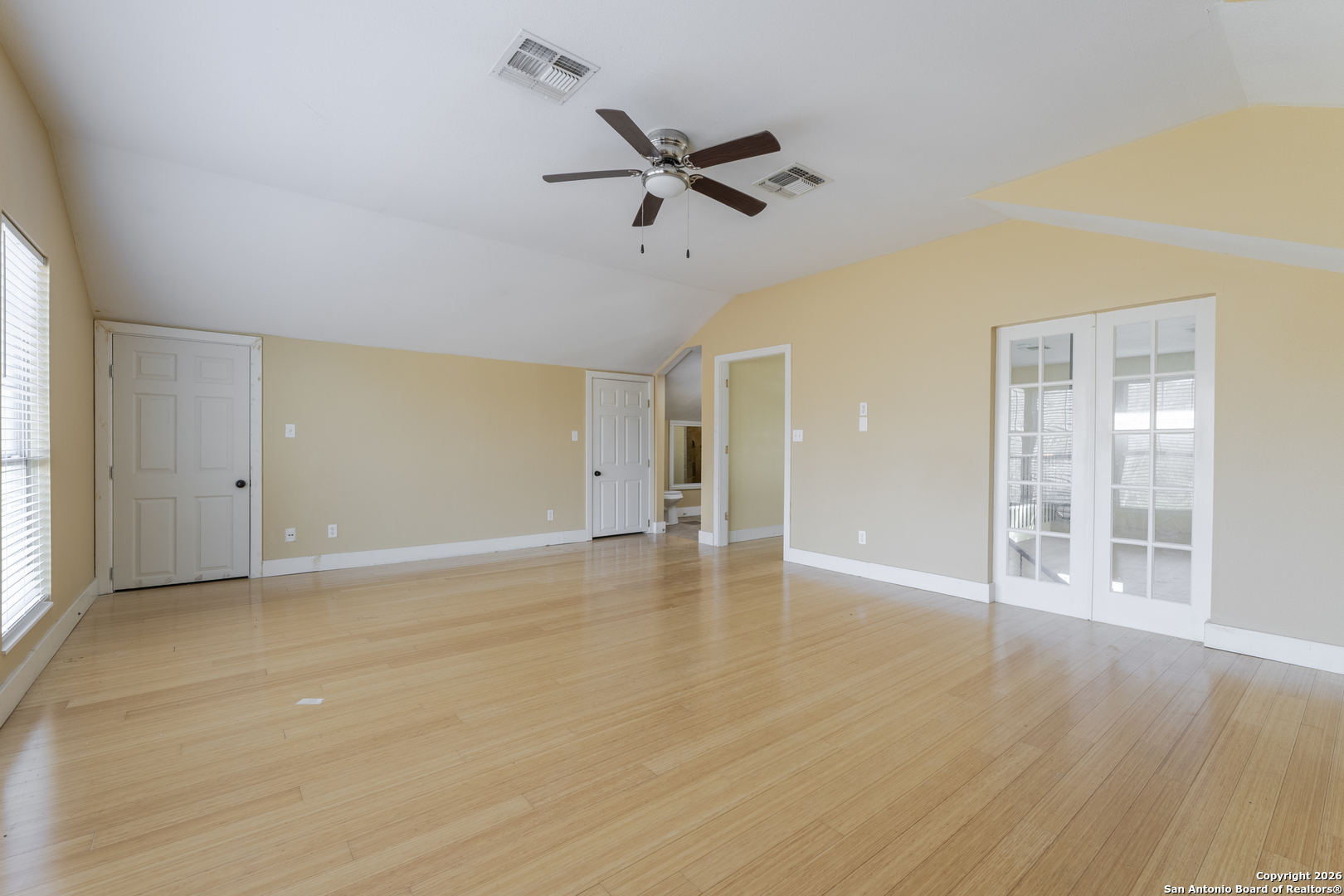 4419 State Highway 71 Columbus, TX 78934 - Photo 17 of 49 a view of an empty room with wooden floor and a window